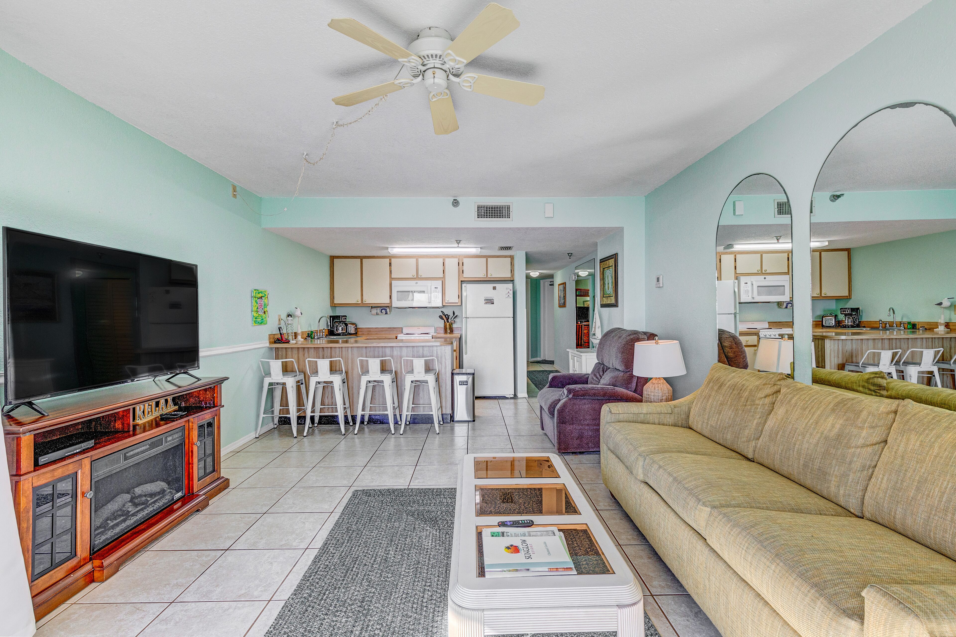 Soothing ocean-view condo with beach access, W/D, balcony, central AC & kitchen