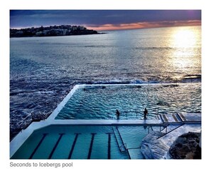 An infinity pool with a view of the sea and a sunset. - KIMA (Beach Lux Boutique Apartment) Private Entry (2min walk Icebergs, Sand) (Bondi Beach)