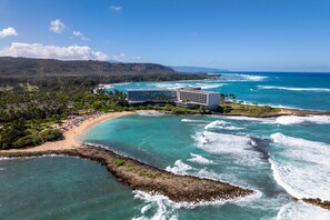 On the beach, sun loungers, beach towels