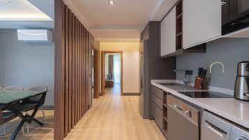 Two Bedroom Apartment | Private kitchen | Fridge, microwave, oven, stovetop