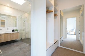 Bathtub, hair dryer, towels, soap