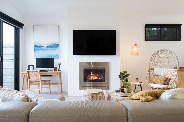 TV, fireplace, books, stereo