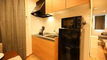 Deluxe Triple Room | Iron/ironing board, free WiFi