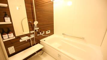 Separate bathtub and shower, free toiletries, hair dryer, towels