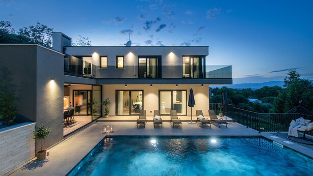 A modern two-story house with a swimming pool, large windows, and outdoor seating. - Gorgeous home in Nedescina with sauna (Nedescina)