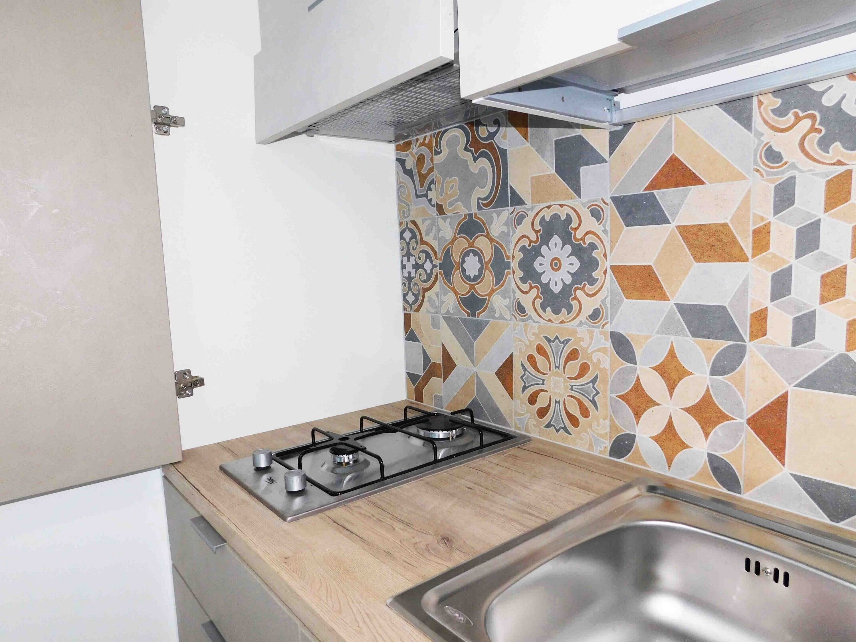 Fridge, stovetop, coffee/tea maker, cookware/dishes/utensils