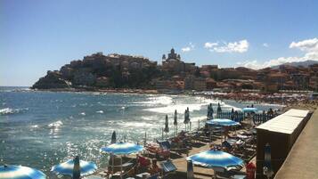 Beach nearby, sun loungers