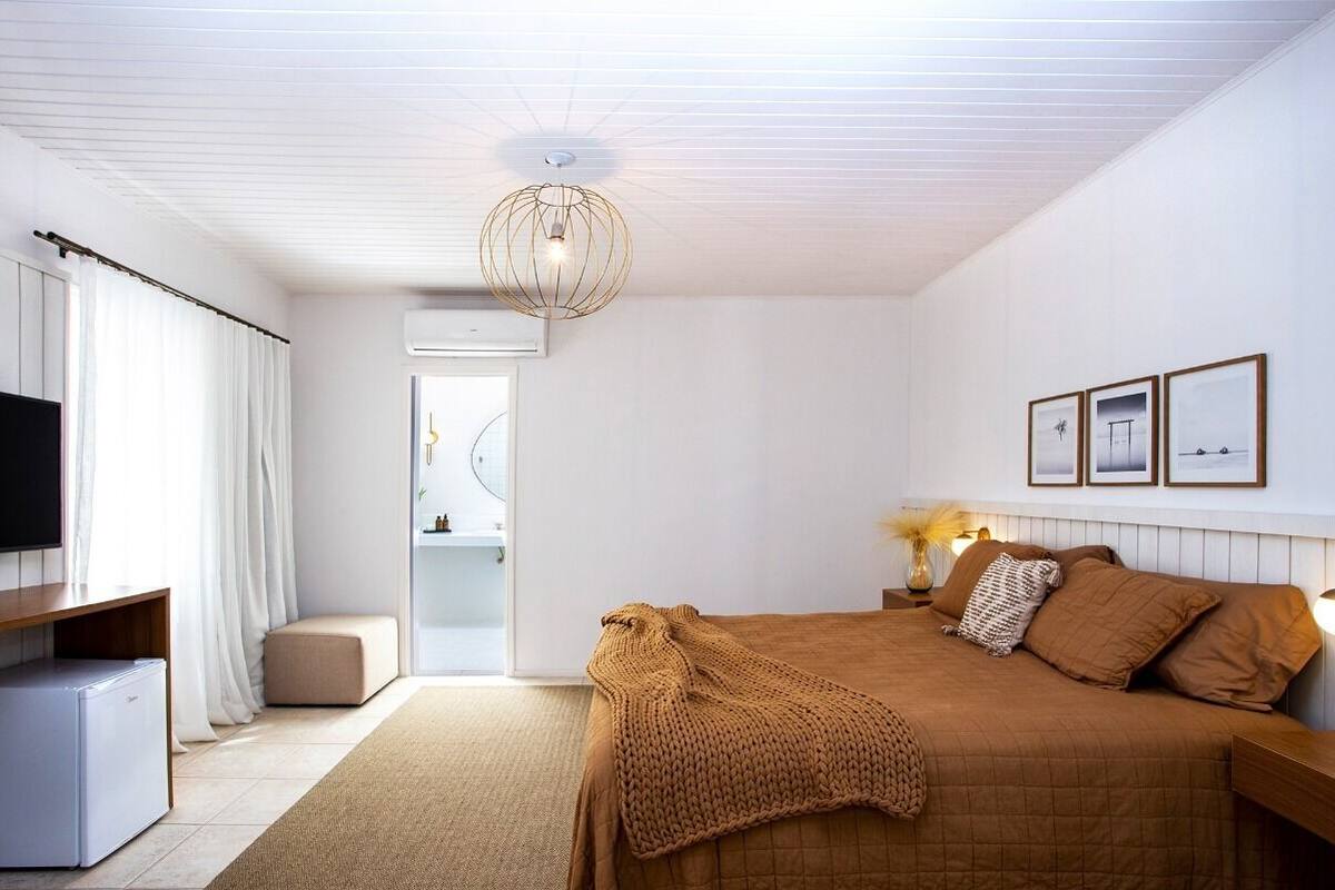 Suite estudio básica | Ropa de cama de alta calidad, camas con pillow-top y minibar