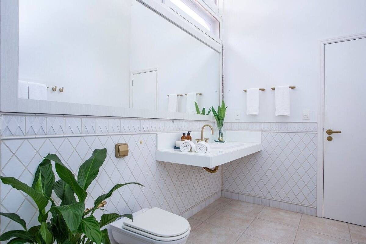 Suite Deluxe | Baño | Regadera, regadera tipo lluvia, amenidades de baño gratuitas