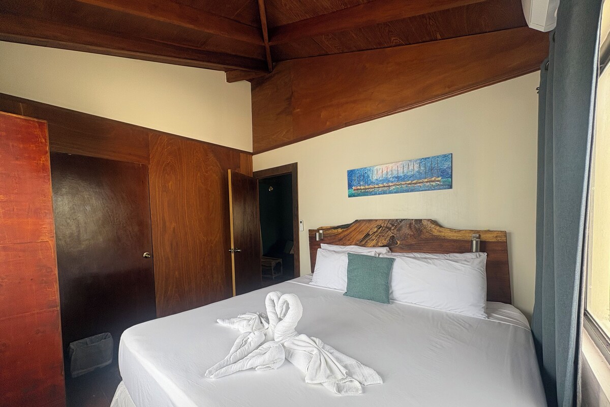 Apartment, 2 Bedrooms, Partial Ocean View | Hypo-allergenic bedding available, minibar, iron/ironing board