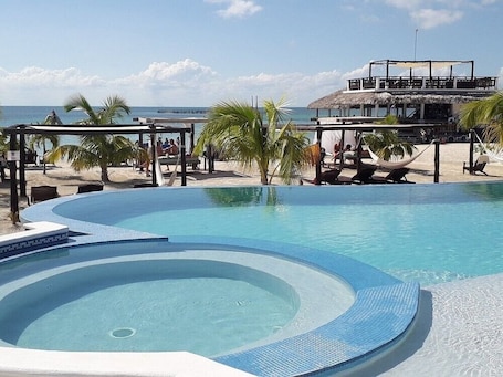 Seasonal outdoor pool, pool umbrellas, sun loungers