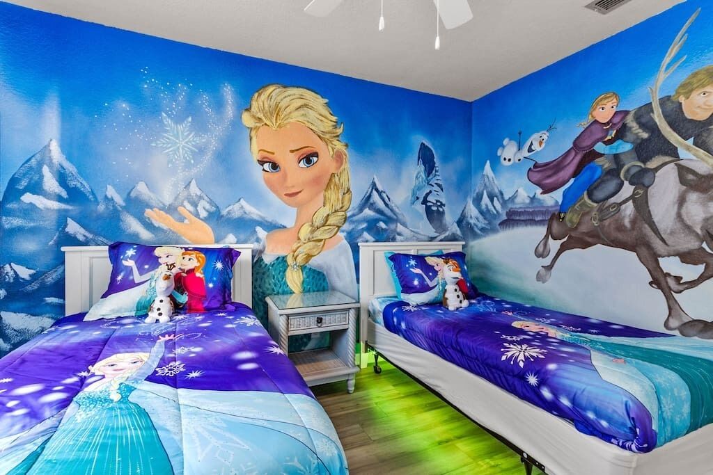 Frozen room with TV, twin beds, closet