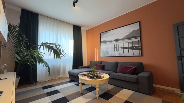 Apartment, 2 Bedrooms | Living area | 32-inch flat-screen TV with digital channels, TV