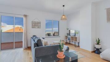Superior Apartment | Living room | 32-inch TV with cable channels