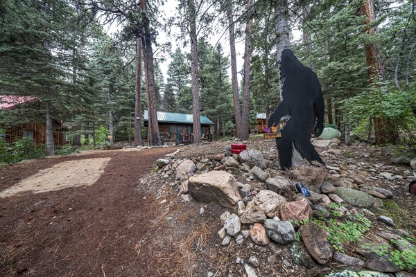 Big Foot waiting to welcome you at the front of the cabin