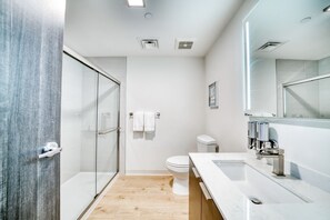 Shower, hair dryer, towels, soap