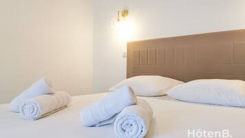 3 slaapkamers, een strijkplank/strijkijzer, beddengoed