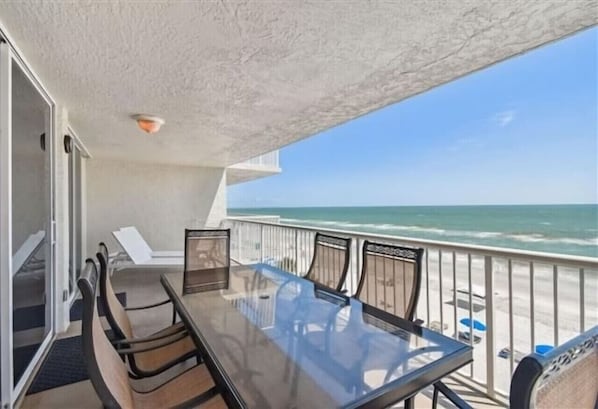Outdoor dining - Modern Comforts Meet Stunning Madeira Beach Ocean Views | 3BR at Seaview 404 | (Madeira Beach)
