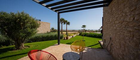 Suite Deluxe, vue sur la mer | Terrasse/patio