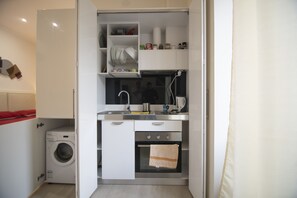 Geladeira, fogão, cooktop, cafeteira/chaleira