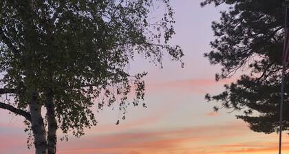 A true paradise lake house with beautiful sunsets year round direct trail access