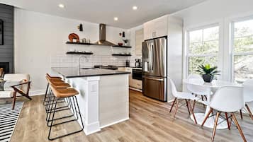 Fridge, coffee/tea maker, cookware/dishes/utensils