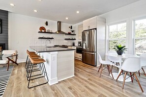 Fridge, coffee/tea maker, cookware/dishes/utensils