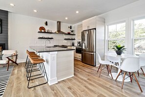 Fridge, coffee/tea maker, cookware/dishes/utensils