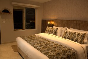 Deluxe tweepersoonskamer | Een minibar, gratis wifi, beddengoed