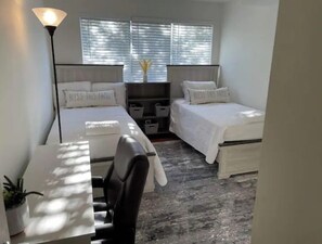 2 bedrooms, desk, iron/ironing board, travel cot