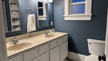 Hair dryer, towels, soap, shampoo