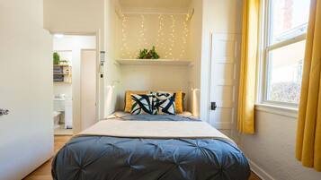 1 bedroom, desk, iron/ironing board, travel crib