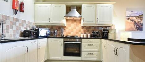 Fridge, dishwasher, cookware/dishes/utensils