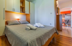 1 quarto, berço de viagem, Wi-Fi de cortesia, roupa de cama