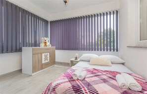 2 chambres, fer et planche à repasser, Wi-Fi gratuit, draps fournis