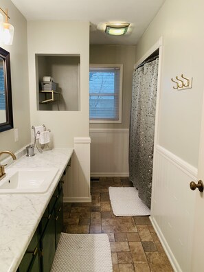 Hair dryer, towels, soap, shampoo