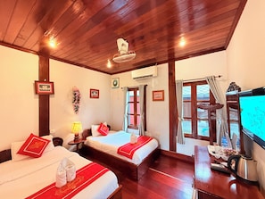 Deluxe Twin Room, Non Smoking, Mountain View | Minibar, individually decorated, desk, laptop workspace - Villa Ouis NamKhan Riverside (Luang Prabang)