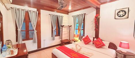 Superior Double Room | Minibar, individually decorated, desk, laptop workspace