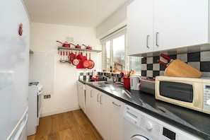 Departamento (1 Bedroom) | Cocina privada | Microondas y horno