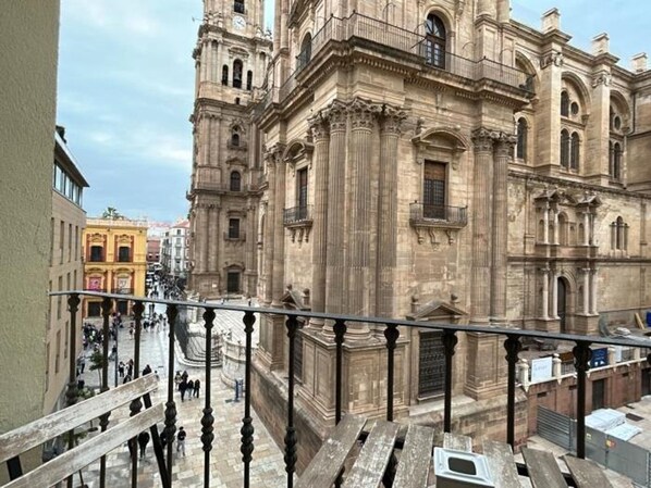 A historic building with classical architecture, featuring columns and detailed stonework.