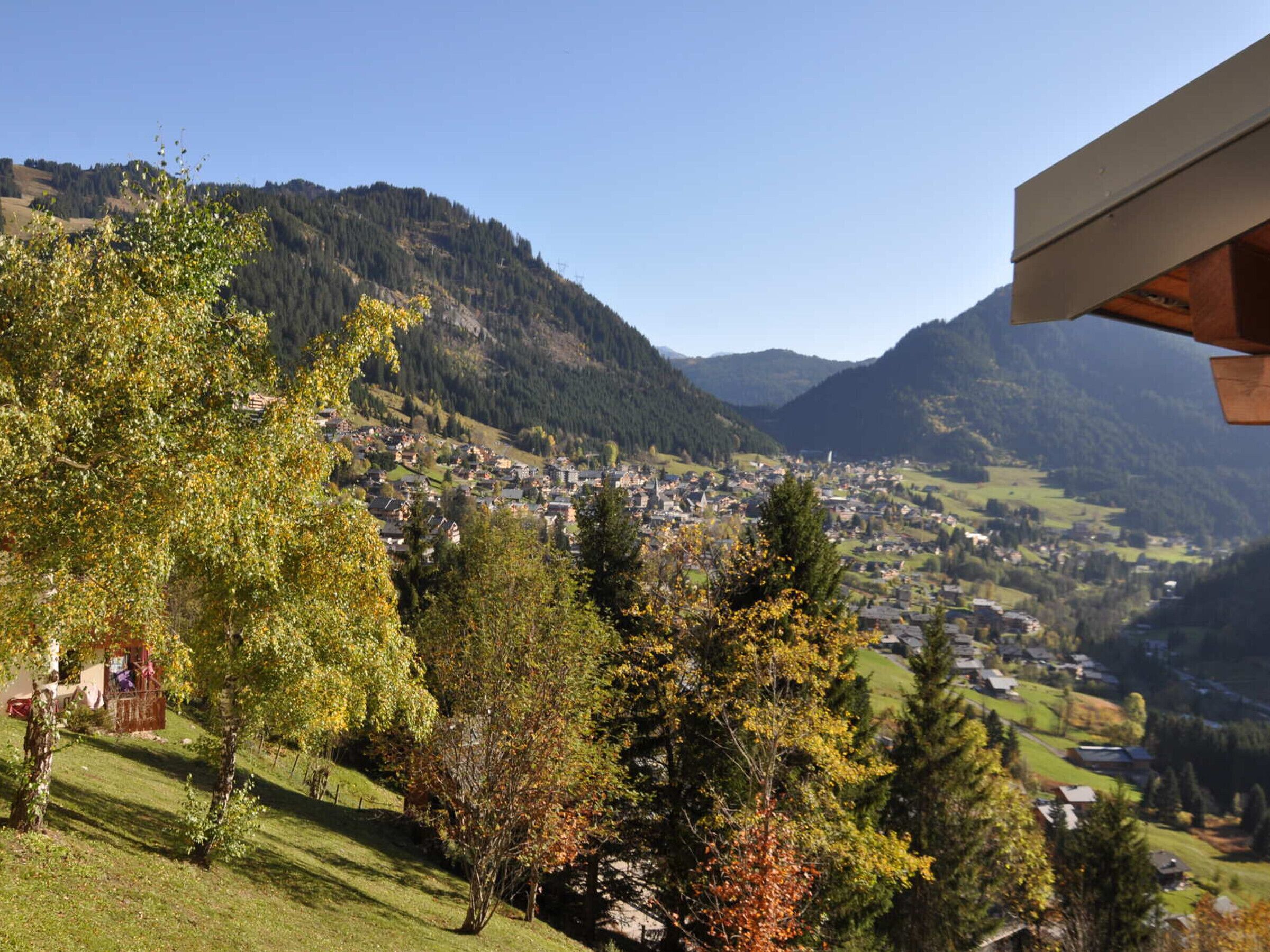 A mountainous landscape with a town nestled in the valley.