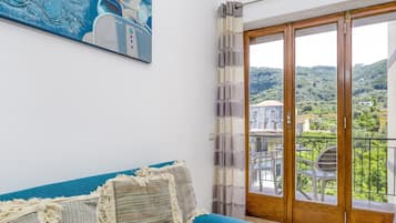 Appartamento Comfort | Area soggiorno | TV a schermo piatto