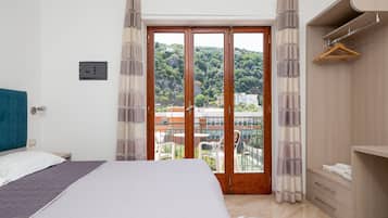 Appartamento Comfort | 2 camere, copriletto in piuma, tende oscuranti, ferro/asse da stiro