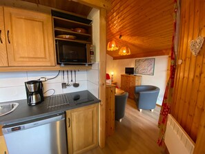 Fridge, microwave, coffee/tea maker, toaster