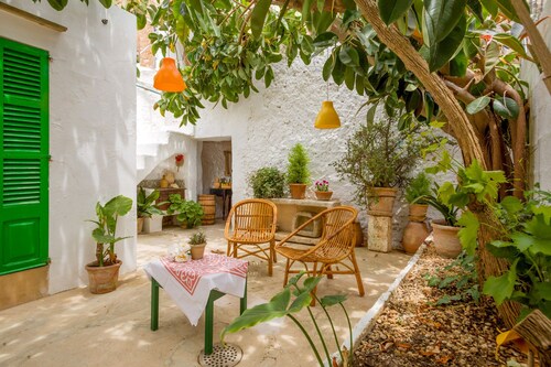 Cas Padrins Art i Jardi