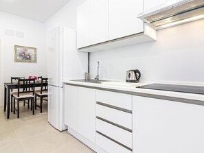 Fridge, microwave, coffee/tea maker, toaster