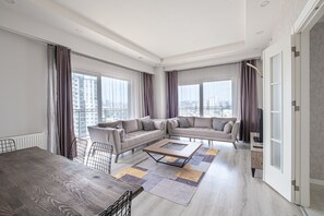 Grand Apartment | Living area | 50-inch Smart TV with digital channels, TV, Netflix