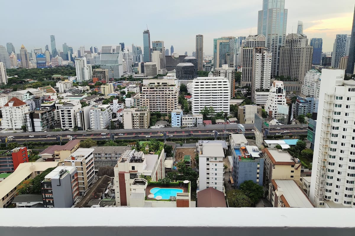 A cityscape with a variety of building types, including high-rise buildings and mid-rise structures.