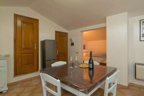 Dining - Studio Apartment 'Podere Nuti - Monolocale L'Eccezione' with Shared Pool and Air Conditioning (Cecina)