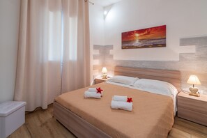 2 quartos, ferros/tábuas de passar roupa, Wi-Fi de cortesia